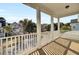 Spacious deck with white railing and views of the neighborhood at 1040 Hills Plantation Dr, Charleston, SC 29412