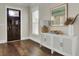 Entryway with dark hardwood floors and white cabinet at 1040 Hills Plantation Dr, Charleston, SC 29412