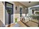 Inviting front porch with rocking chairs and decor at 1040 Hills Plantation Dr, Charleston, SC 29412