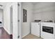 Laundry room with washer, dryer, and shelving at 1040 Hills Plantation Dr, Charleston, SC 29412