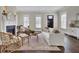 Living area with hardwood floors, neutral decor, and fireplace at 1040 Hills Plantation Dr, Charleston, SC 29412
