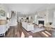 Bright living room with hardwood floors, fireplace, and open floor plan at 1040 Hills Plantation Dr, Charleston, SC 29412