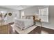 Main bedroom with king bed, wood floors, and access to private deck at 1040 Hills Plantation Dr, Charleston, SC 29412
