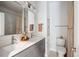 Stylish bathroom with gray vanity, double sinks, and modern fixtures at 1245 Crooked Oak Rd, Charleston, SC 29492