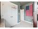 Spacious bedroom with a basketball hoop, American flag, and ample closet space at 1245 Crooked Oak Rd, Charleston, SC 29492