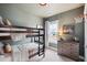 Fun ' bedroom with a bunk bed, dresser, and basketball hoop at 1245 Crooked Oak Rd, Charleston, SC 29492
