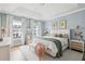 Spacious main bedroom with a king-size bed and calming decor at 1245 Crooked Oak Rd, Charleston, SC 29492