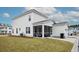 Two-story home with a large backyard, screened porch and detached garage at 1245 Crooked Oak Rd, Charleston, SC 29492