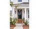 Stylish front door entrance with potted plants at 1245 Crooked Oak Rd, Charleston, SC 29492