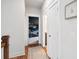 Bright hallway with hardwood floors, leading to bedrooms and bathroom at 1245 Crooked Oak Rd, Charleston, SC 29492
