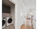 Convenient laundry room with washer, dryer, and extra storage at 1245 Crooked Oak Rd, Charleston, SC 29492