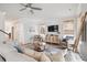 Bright living room with comfy seating, stylish decor, and a large TV at 1245 Crooked Oak Rd, Charleston, SC 29492