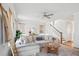 Cozy living room with sectional sofa and large windows at 1245 Crooked Oak Rd, Charleston, SC 29492
