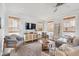 Relaxing living room featuring neutral decor and wood floors at 1245 Crooked Oak Rd, Charleston, SC 29492