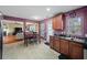 Kitchen features dark wood cabinets and a breakfast bar at 130 Decatur Dr, Summerville, SC 29486