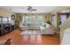 Spacious living room with hardwood floors, large sectional sofa, and fireplace at 130 Decatur Dr, Summerville, SC 29486