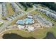 Aerial view showing community pool, playground, and residential neighborhood at 133 Summit View Dr, Summerville, SC 29486