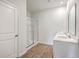 Bathroom features double vanity, a large shower, and wood-look floors at 133 Summit View Dr, Summerville, SC 29486