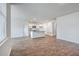 Open living room with kitchen island and wood-look flooring at 133 Summit View Dr, Summerville, SC 29486