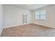 Simple office with wood-look floors and floating shelves at 133 Summit View Dr, Summerville, SC 29486