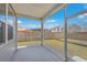Screened porch overlooks backyard with view of neighboring houses at 133 Summit View Dr, Summerville, SC 29486