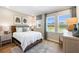 Bedroom with a brown leather bed, hardwood floors, and a rug at 141 Winding Grove Lane Ln, Moncks Corner, SC 29461