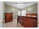 Spacious bedroom with wood flooring and a large dresser at 150 Cotillion Cres, Summerville, SC 29483