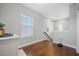 Upstairs landing with hardwood floors and a view of the staircase at 152 Callibluff Dr, Summerville, SC 29486
