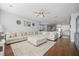 Open concept living room with hardwood floors and views into the kitchen at 152 Callibluff Dr, Summerville, SC 29486