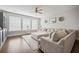 Bright living room featuring a large sectional sofa and hardwood floors at 152 Callibluff Dr, Summerville, SC 29486