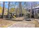 Large backyard with playset, fire pit, and patio at 1960 Pinehurst Ave, Charleston, SC 29414