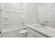 Clean bathroom with a shower/tub combo, toilet and vanity with quartz countertop at 199 Denham St, Summerville, SC 29486
