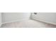 Simple bedroom with neutral wall paint and wall-to-wall carpeting at 199 Denham St, Summerville, SC 29486