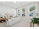 Spacious bedroom with carpeted floors, large windows, and neutral decor at 211 Abercom Place Dr, Moncks Corner, SC 29461
