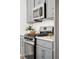 Modern kitchen with stainless steel appliances and gray cabinets at 211 Abercom Place Dr, Moncks Corner, SC 29461