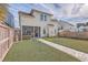Backyard features a stone path and a view of the house at 216 Bumble Way, Summerville, SC 29485