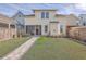 Large backyard with a stone pathway leading to the house at 216 Bumble Way, Summerville, SC 29485