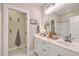 Bathroom with double vanity, mirror, and linen closet at 216 Bumble Way, Summerville, SC 29485