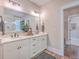 Double vanity bathroom with modern finishes and walk-in shower at 216 Bumble Way, Summerville, SC 29485