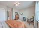 Bedroom with a queen bed, two armchairs, and built-in dresser at 216 Bumble Way, Summerville, SC 29485