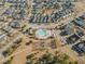 Aerial view of community pool and surrounding neighborhood at 216 Bumble Way, Summerville, SC 29485