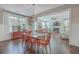 Bright dining room with hardwood floors and view into living room at 216 Bumble Way, Summerville, SC 29485