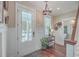Bright and airy entryway with hardwood floors and a view of the front porch at 216 Bumble Way, Summerville, SC 29485