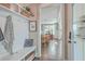 Bright entryway with bench, storage, and view into dining area at 216 Bumble Way, Summerville, SC 29485