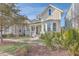 Craftsman style home with a front porch, well-maintained landscaping, and walkway at 216 Bumble Way, Summerville, SC 29485