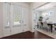 Bright entryway with hardwood floors and view into the dining room at 2251 Spring Hope Dr, Mount Pleasant, SC 29466