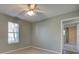 Bright bedroom with ceiling fan and double closets at 228 Muirfield Pkwy, Charleston, SC 29414