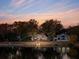 Lovely waterfront home at sunset with beautiful sky at 2281 Portside Way, Charleston, SC 29407