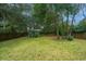 Large backyard with shed and wooden fence at 2336 Parkstone Dr, Charleston, SC 29414