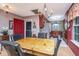 Cozy dining area features a rustic wooden table and a chandelier at 2336 Parkstone Dr, Charleston, SC 29414